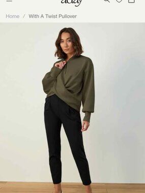 Aday with a twist pull over. Black Women's size Large